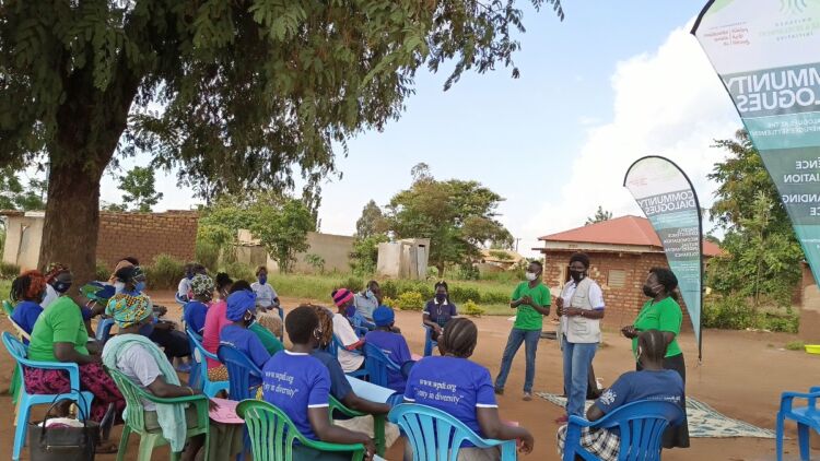 The community of the Kiryandongo Refugee Settlement come together for Community Dialogues with WPDI